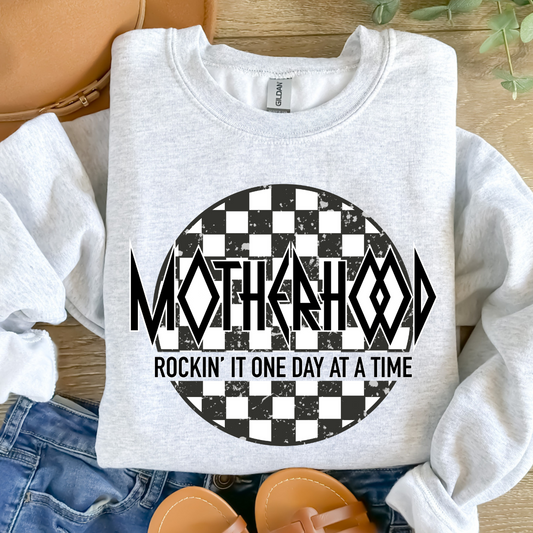 CHECKERED MOTHERHOOD